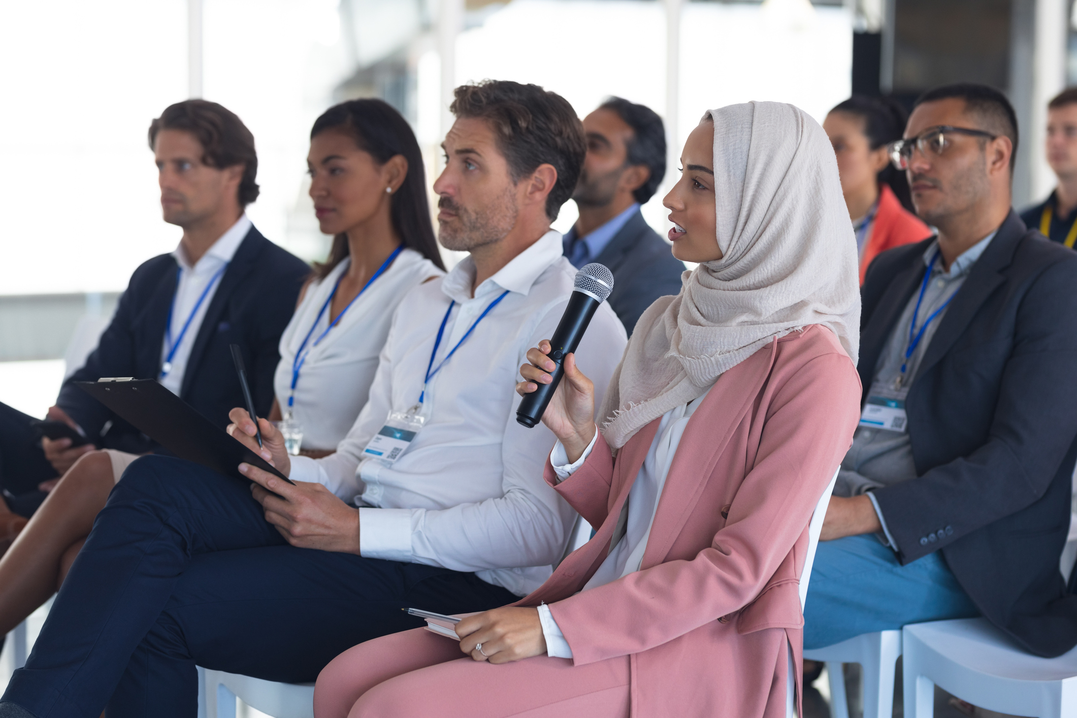 woman in audience asking question