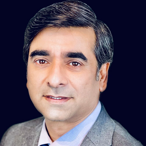 Professional headshot of Dr. Anjum Khurshid